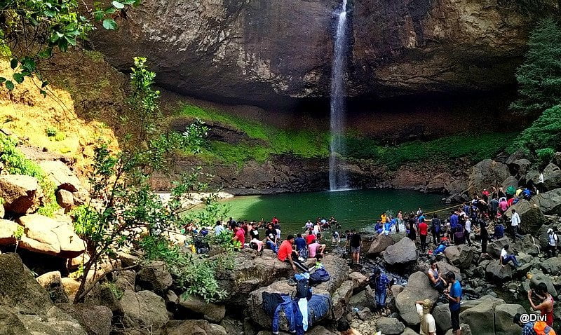 People gathered around the main waterfall